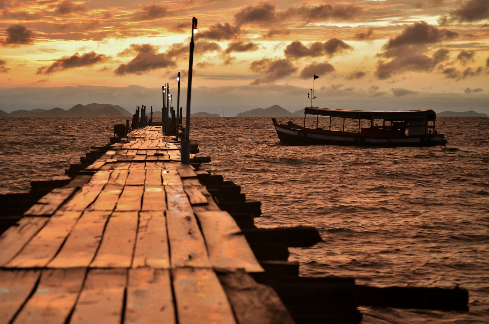 Sunrise on Koh Ach Seh main pier.