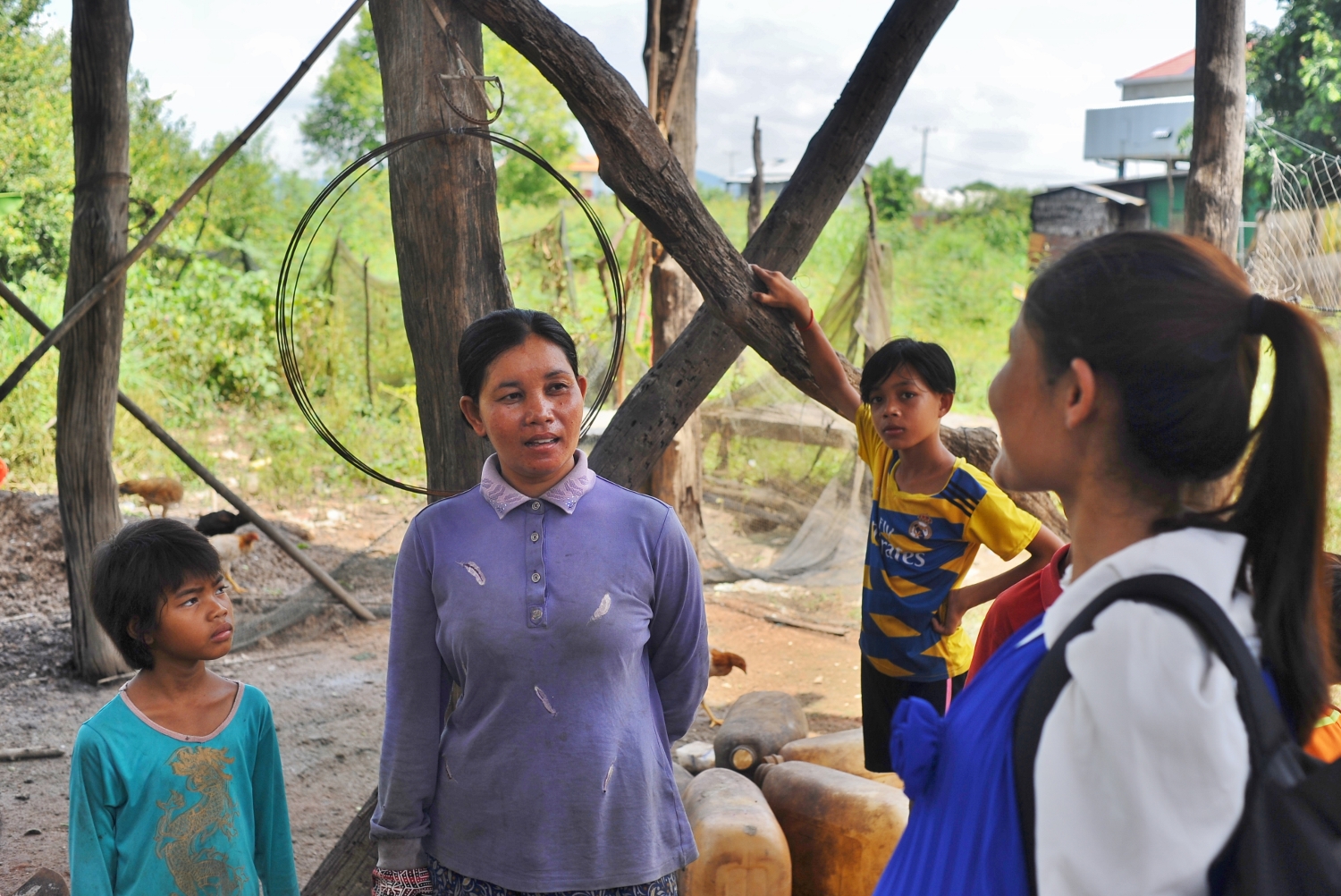 Yin Arn, a fisherwoman, and her fanmily in Samroang Saean village